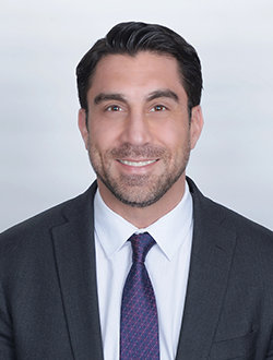 Smiling man in business suit portrait.